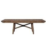 A rustic rectangular wooden dining table with a weathered brown finish and a central black metal X-brace base, shown against a plain white background.