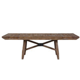 A rustic rectangular wooden dining table with a weathered brown finish and a central black metal X-brace base, shown against a plain white background.