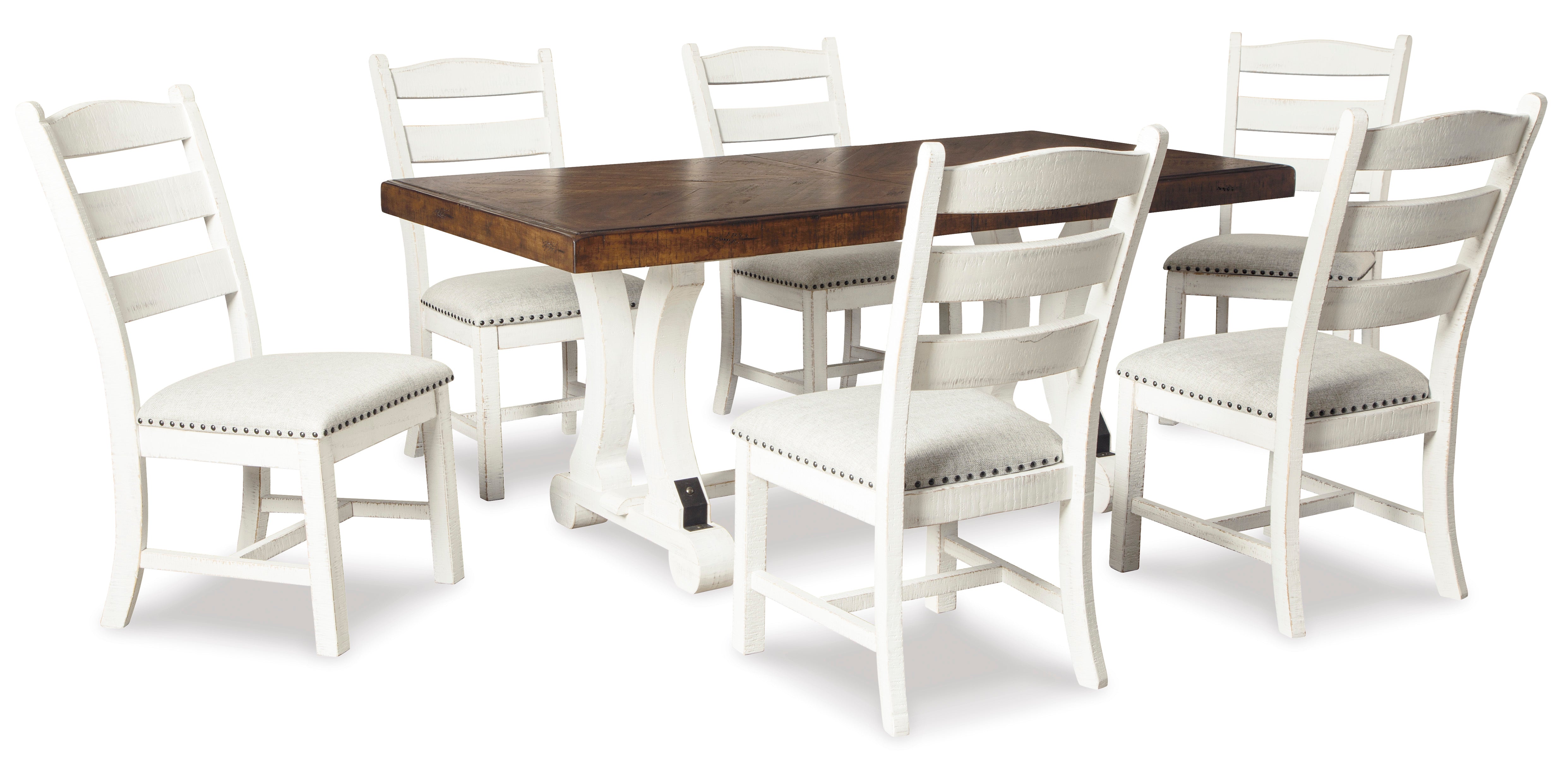 A 7-piece dining room set featuring a rectangular table with a dark brown wood top and white trestle base, surrounded by six white ladder-back chairs with off-white upholstered seats and silver nailhead trim.