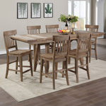 A rustic 7-piece counter height dining table set with a rectangular wooden table and six matching slatted-back stools, shown in a bright dining room setting.