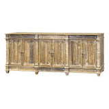 A rustic distressed wood sideboard cabinet with four double doors, distressed brown and beige weathered wood finish, and small turned metal knobs, shown on a plain white background.