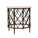 A round accent side table featuring a light beige marble top and a dark bronze metal base with an intricate lattice pattern.