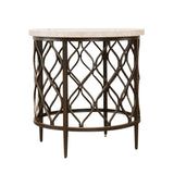 A round accent side table featuring a light beige marble top and a dark bronze metal base with an intricate lattice pattern.