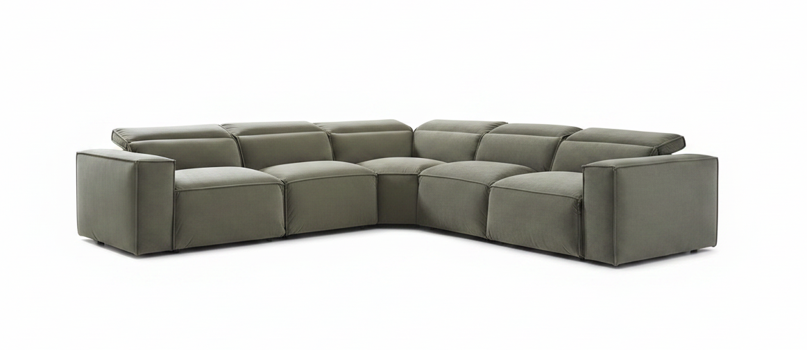 Modern living room with a sectional sofa, coffee table, and decorative elements.