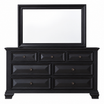 Black wooden dresser with six drawers and a matching rectangular mirror, shown on a plain white background.