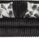 A black ribbed velvet loveseat sofa with two square throw pillows featuring a black, white, and gray geometric pattern, shown against a plain white background.