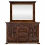 A dark brown wooden dresser with an attached mirror, featuring multiple drawers and cabinet doors with decorative panel details, shown against a plain white background.