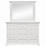 A white wooden dresser with a matching hutch mirror, featuring multiple drawers and cabinet doors with decorative panel details and small round knobs.
