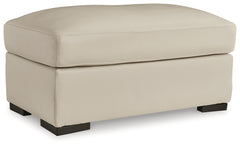 Ashley Furniture - TRESURE TROVE ALMOND OTTOMAN - White Leather Match - Ottomans