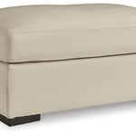 Ashley Furniture - TRESURE TROVE ALMOND OTTOMAN - White Leather Match - Ottomans