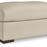 Ashley Furniture - TRESURE TROVE ALMOND OTTOMAN - White Leather Match - Ottomans