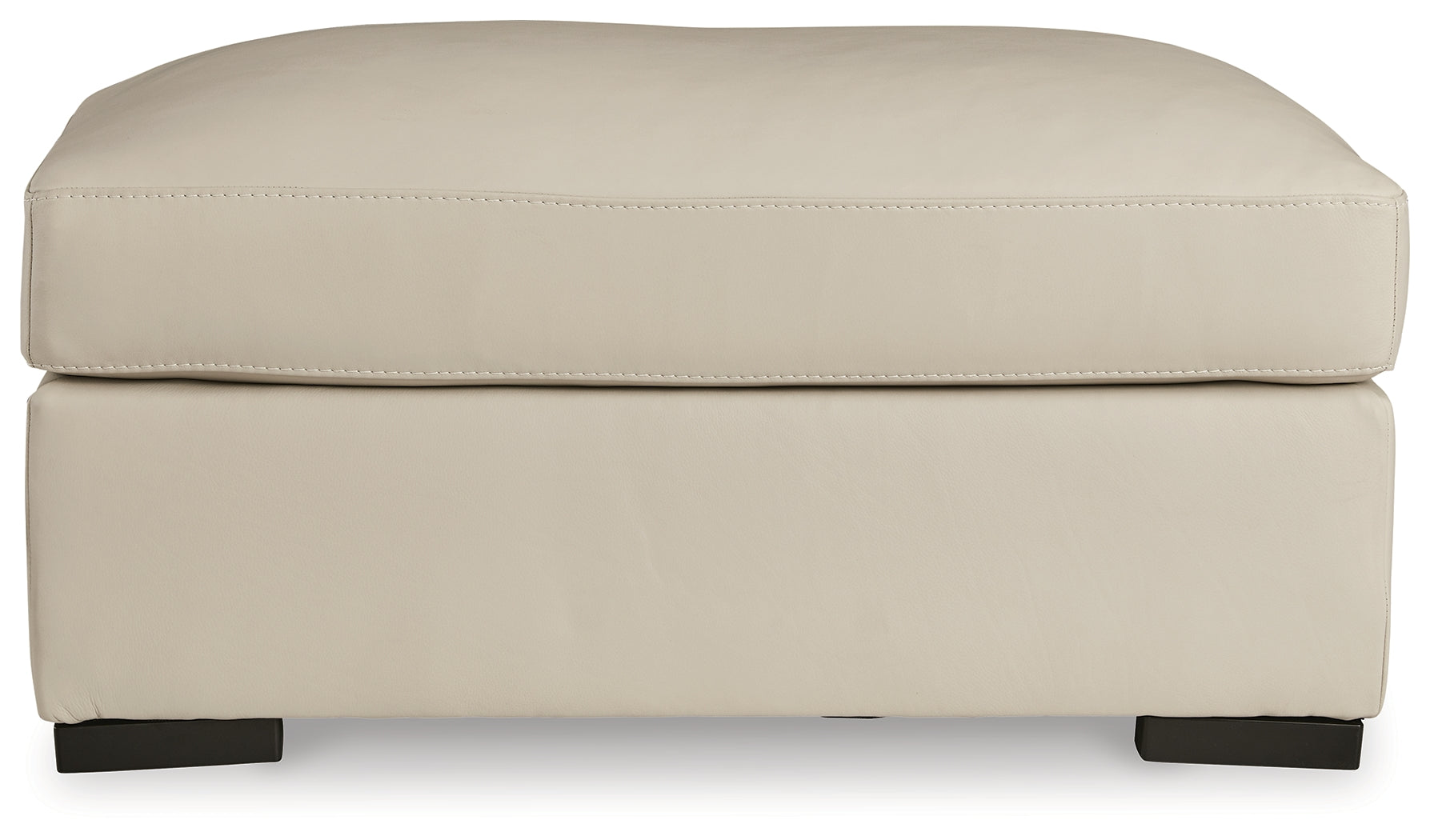 Ashley Furniture - TRESURE TROVE ALMOND OTTOMAN - White Leather Match - Ottomans - Additional View 2