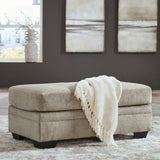 Ashley Furniture - Stonemeade Ottoman - Taupe - Light Brown Fabric - Ottomans - Additional View 1