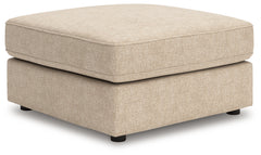 Ashley Furniture - SEYLER SAND ACCENT OTTOMAN - Beige Fabric - Ottomans