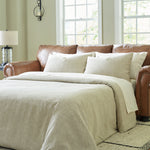 Ashley Furniture - Carianna Queen Sofa Sleeper - Caramel - Light Brown Leather Match - Sofas - Additional View 1