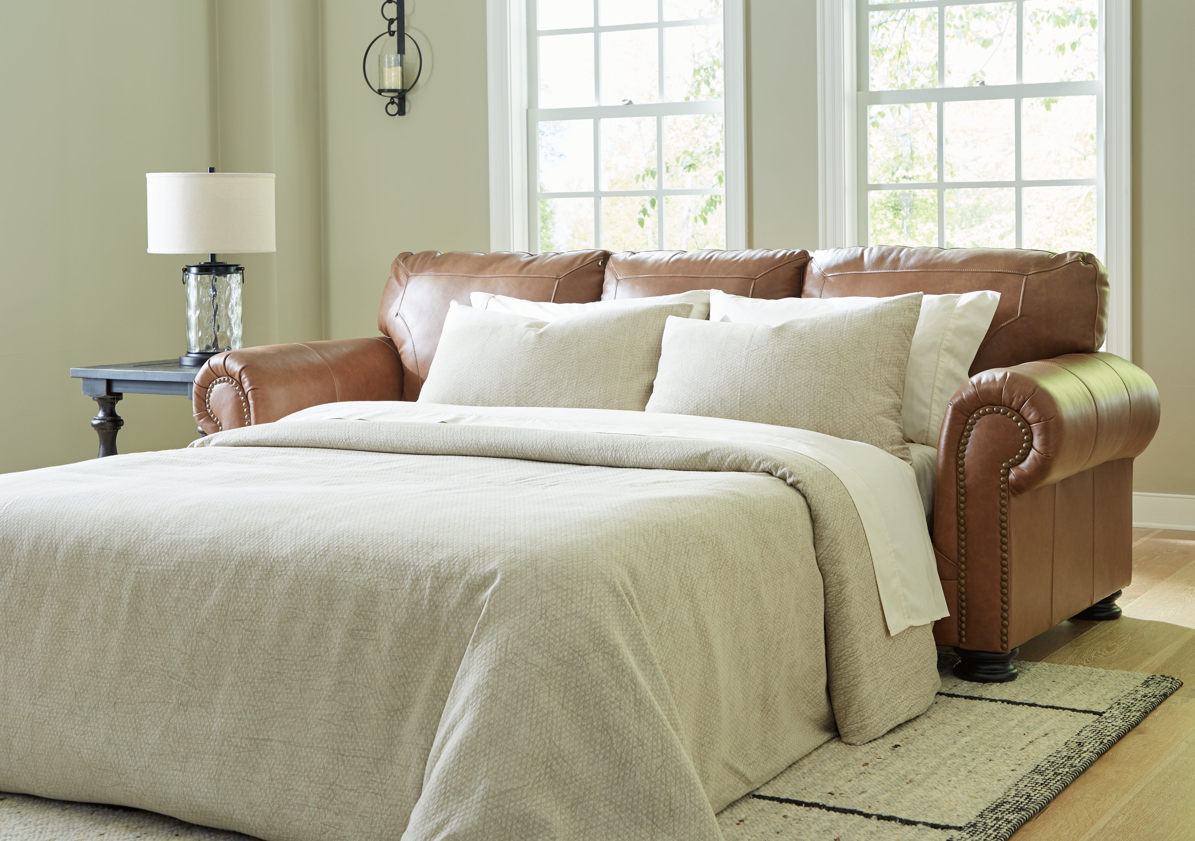 Ashley Furniture - Carianna Queen Sofa Sleeper - Caramel - Light Brown Leather Match - Sofas - Additional View 1