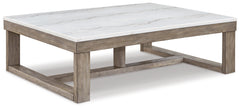 Ashley Furniture - LOYASKA COCKTAIL TABLE - Dark Brown Marble/Stone - Tables