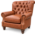 A classic brown tufted leather armchair with rolled arms, brass nailhead trim, and dark wooden legs, shown on a plain white background.