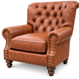 A classic brown tufted leather armchair with rolled arms, brass nailhead trim, and dark wooden legs, shown on a plain white background.