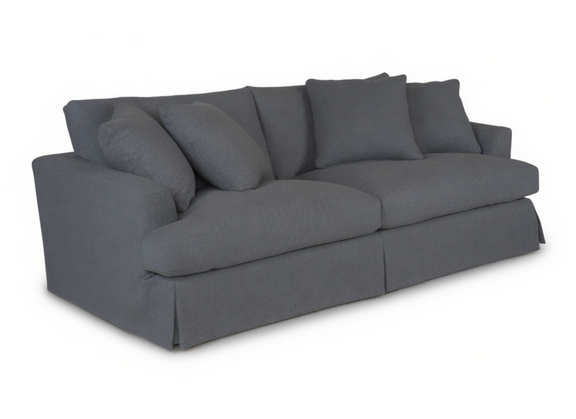 A dark gray slipcovered loveseat sofa with matching throw pillows, shown from a three-quarter angle on a white background.