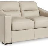 Ashley Furniture - TRESURE TROVE ALMOND LOVESEAT - White Leather Match - Loveseats