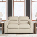 Ashley Furniture - TRESURE TROVE ALMOND LOVESEAT - White Leather Match - Loveseats - Additional View 1