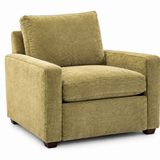 An upholstered armchair in a textured olive green fabric, shown from a three-quarter angle on a solid white background.