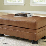 Ashley Furniture - CARIANNA CARAMEL LEATHER OTTOMAN - Light Brown Leather Match - Ottomans - Additional View 1
