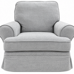 A light gray upholstered armchair with a skirted base, rolled arms, and a high back cushion, shown against a plain white background.