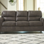 Ashley Furniture - NAVI SMOKE SOFA - Dark Gray Faux Leather - Sofas - Additional View 1
