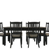 A 7-piece dining table set featuring a rectangular dark wood table and five matching slatted-back chairs with gray upholstered seats, shown against a plain white background.