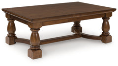 Ashley Furniture - STURLAYNE COCKTAIL TABLE - Dark Brown Wood - Tables