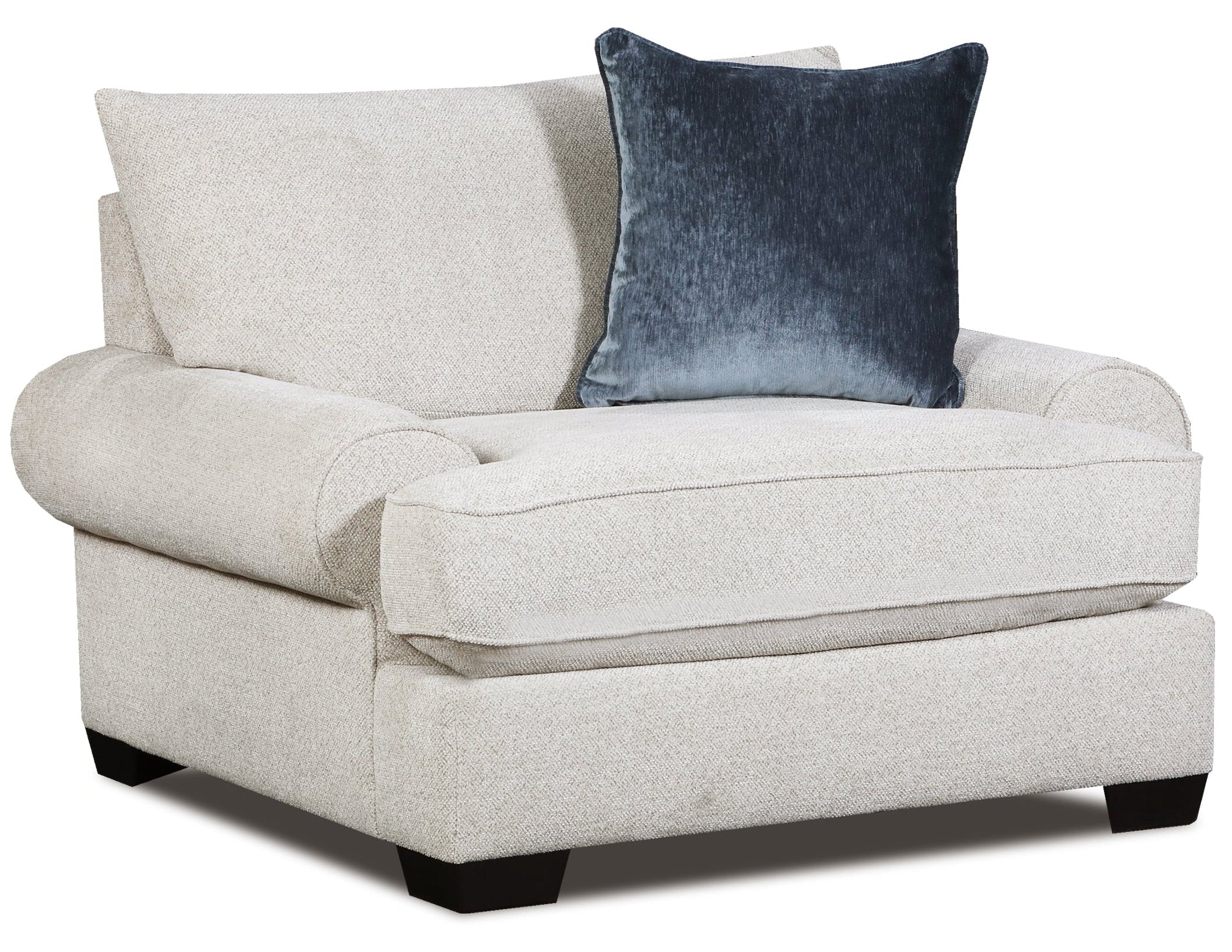A light beige upholstered armchair with a dark blue velvet accent pillow, shown on a plain white background.