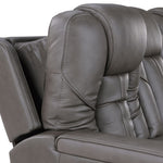Gray leather recliner chair with armrests on a white background