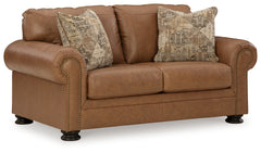 Ashley Furniture - CARIANNA CARAMEL LEATHER LOVESEAT - Light Brown Leather Match - Loveseats