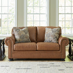 Ashley Furniture - CARIANNA CARAMEL LEATHER LOVESEAT - Light Brown Leather Match - Loveseats - Additional View 1