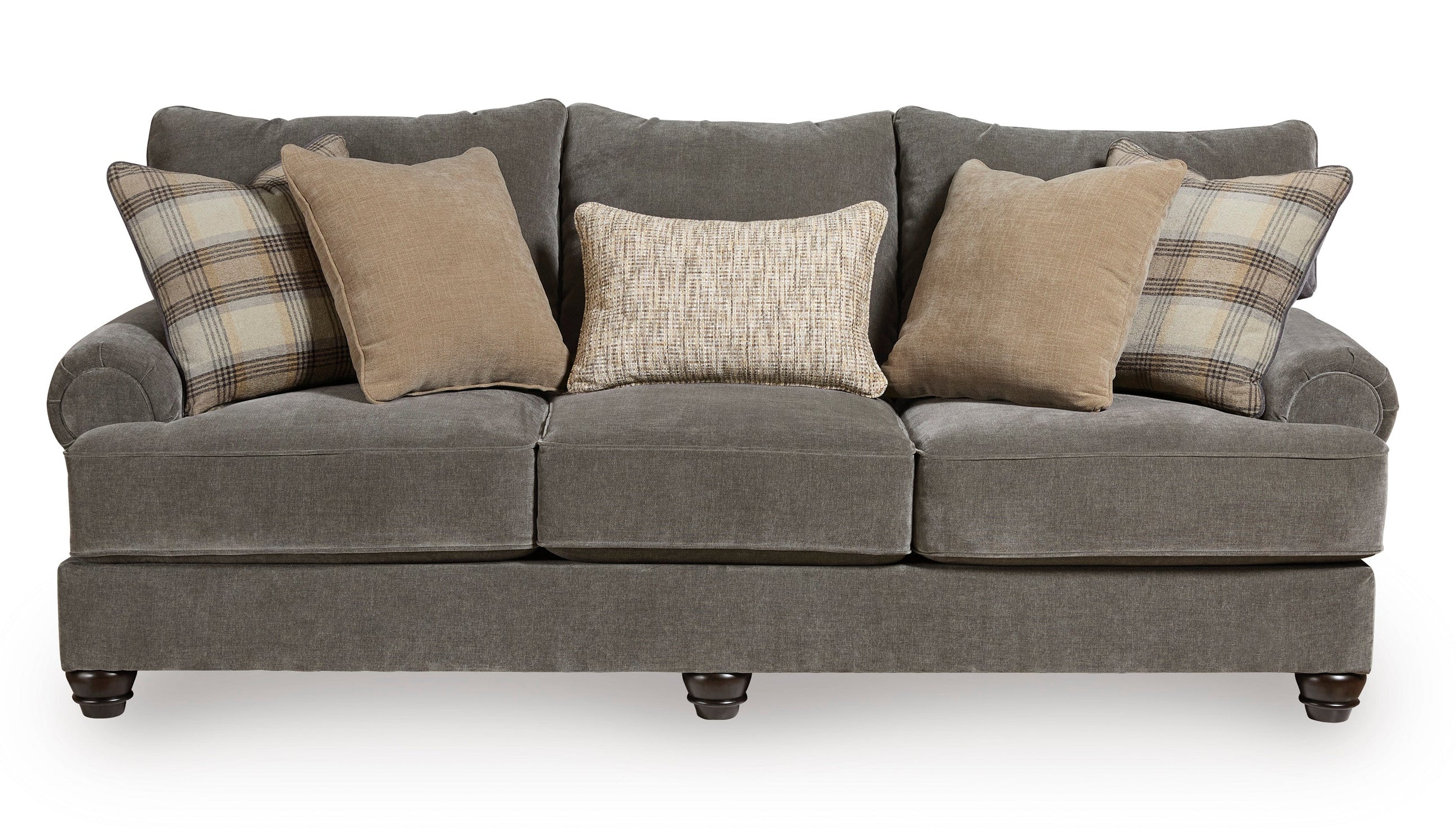 A three-seater upholstered sofa in dark gray fabric, styled with five throw pillows including two plaid and two solid beige/cream cushions, shown against a plain white background.