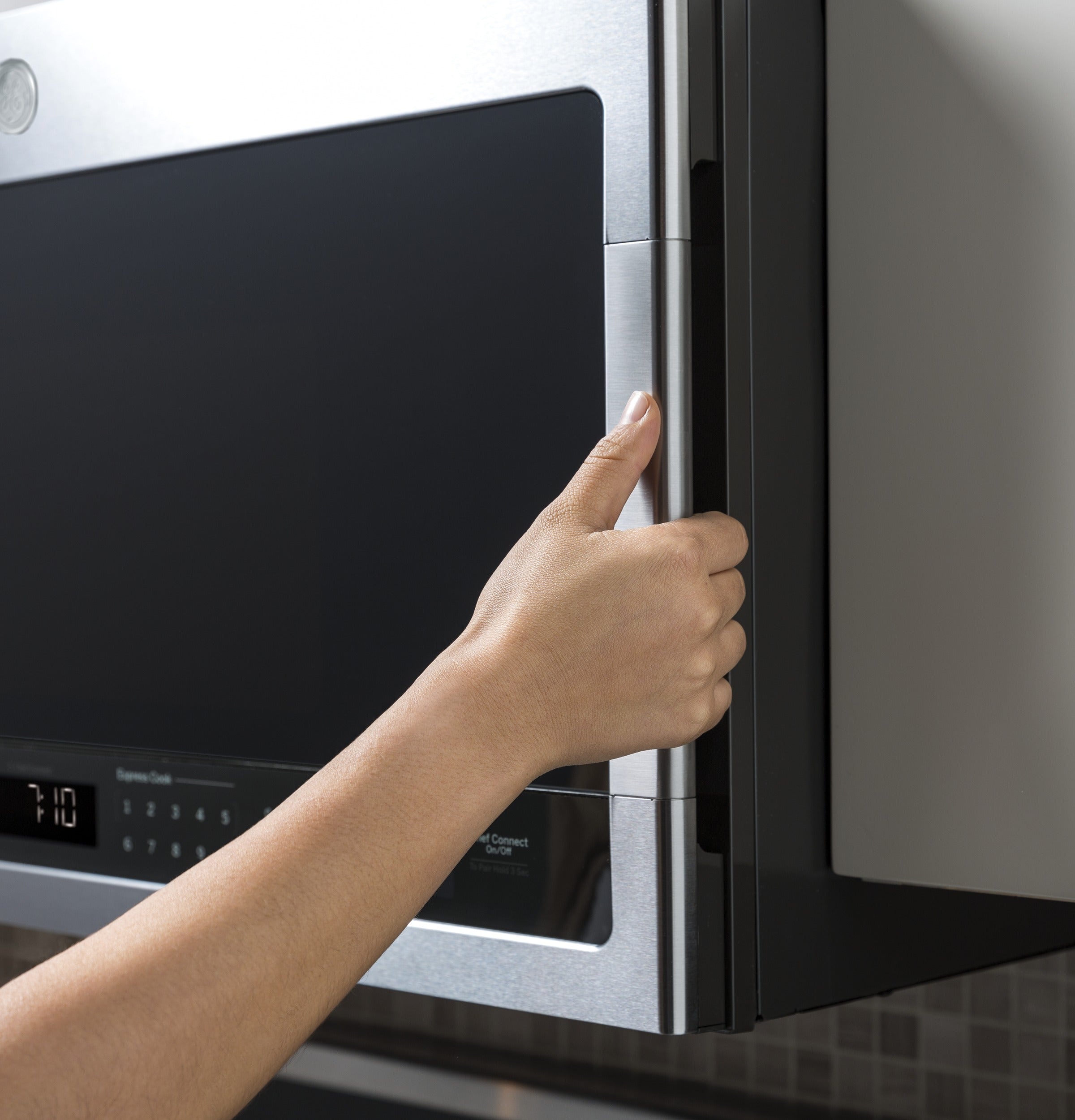 GE PROFILE STAINLESS 2.1CU OVER-THE-RANGE MICROWAVE OVEN - Pearl Silver|Black - Microwaves - Additional View 3