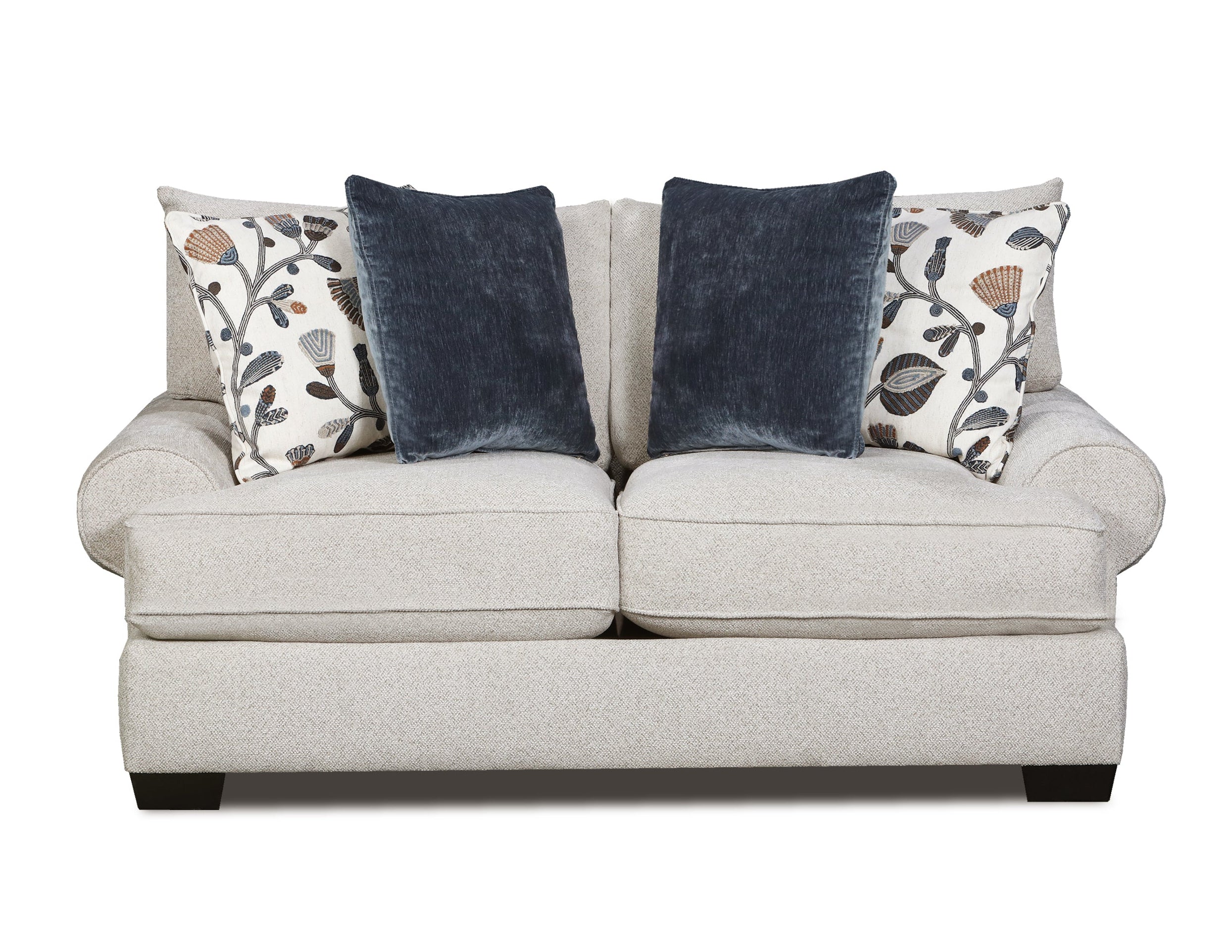 A light beige upholstered loveseat with two dark navy velvet throw pillows and two patterned accent pillows, shown against a plain white background.