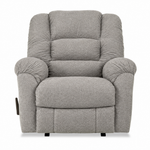 A light gray upholstered recliner chair with padded backrest, wide armrests, and a cushioned seat, shown against a plain white background.