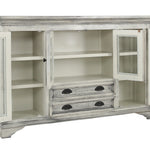 A distressed white wooden sideboard cabinet with glass doors, open to reveal shelves and two drawers with dark metal handles, shown on a plain white background.