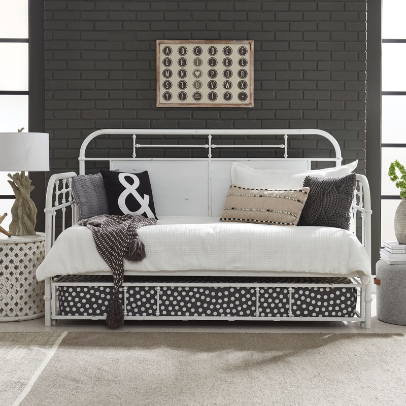 White metal twin daybed with trundle.
