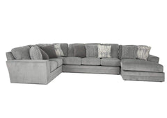 A light gray fabric sectional sofa with a left-facing chaise lounge and multiple decorative throw pillows, shown against a plain white background.