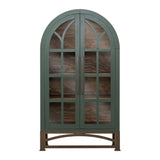 An arched glass-front cabinet with a muted sage green frame and dark brown wood interior and base, shown against a plain white background.