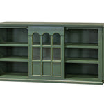 A green wooden sideboard cabinet with its doors open, featuring glass-paneled doors with arched tops and multiple interior shelves, shown against a plain white background.