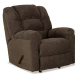 A dark brown upholstered recliner chair shown from a three-quarter angle on a plain white background.