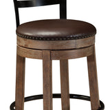 Ashley Furniture - PINNADEL 24" UPHOLSTERED SWIVEL BARSTOOL - Light Brown Leather Match|Metal|Wood - Stools