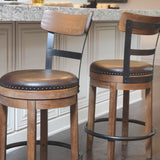 Ashley Furniture - PINNADEL 24" UPHOLSTERED SWIVEL BARSTOOL - Light Brown Leather Match|Metal|Wood - Stools - Additional View 1