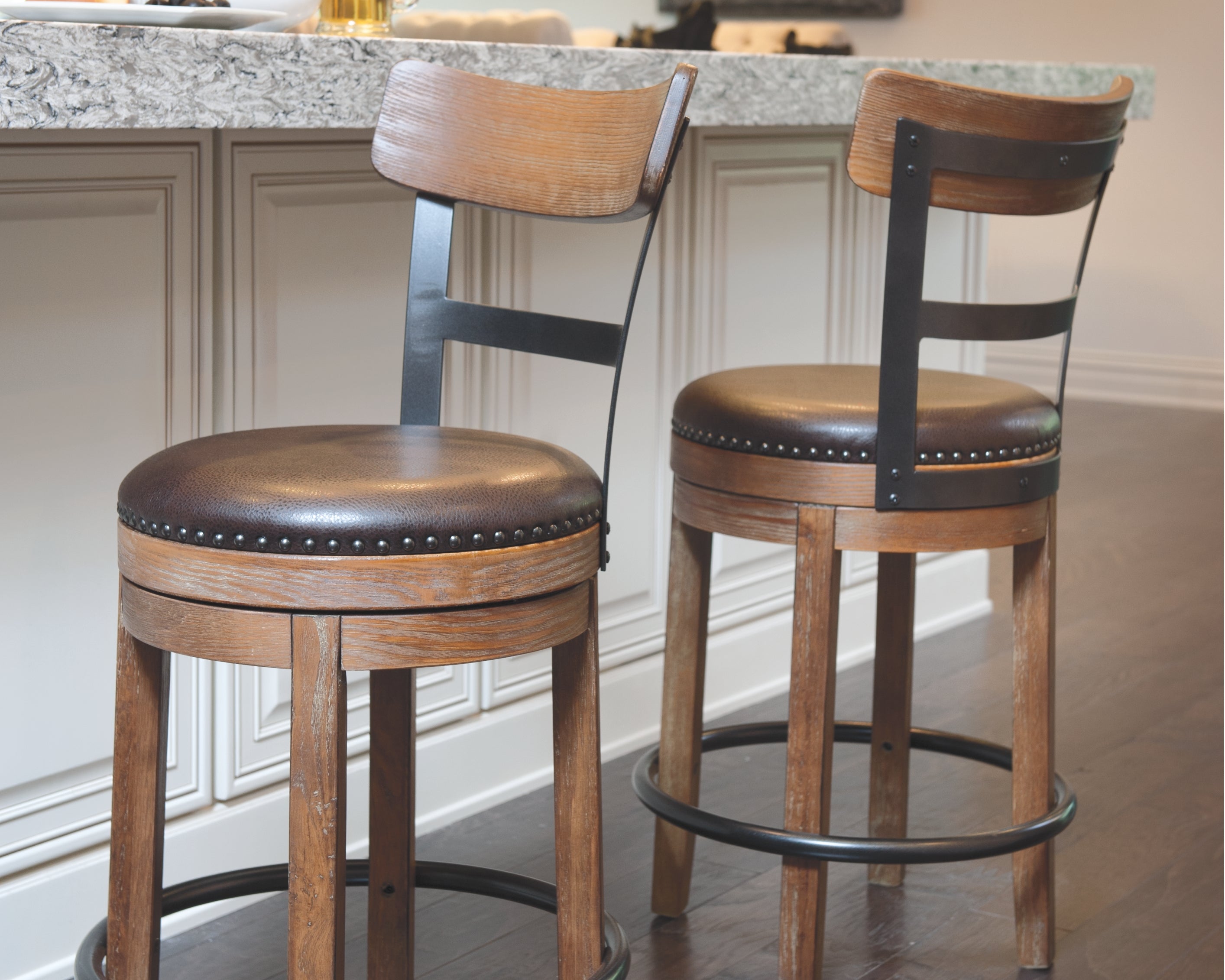 Ashley Furniture - PINNADEL 24" UPHOLSTERED SWIVEL BARSTOOL - Light Brown Leather Match|Metal|Wood - Stools - Additional View 1