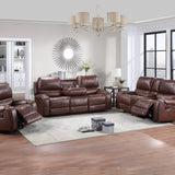 Brown leather reclining sofa set in a living room with wooden floor and large windows.